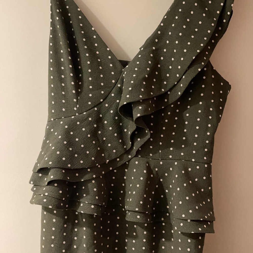Green polka dot asymmetrical spaghetti Strap dress. Size Medium. Never worn